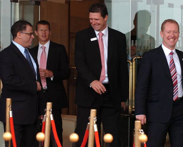 Niall Quinn and Steve Cram leaving the Stadium of Light with FIFA inspectors.
It's a photo from the Sunderland Echo archives taken in August 2010.