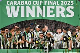 Newcastle United's Brazilian midfielder Bruno Guimaraes and Newcastle United's Brazilian midfielder Joelinton celebrate.