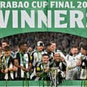 Newcastle United's Brazilian midfielder Bruno Guimaraes and Newcastle United's Brazilian midfielder Joelinton celebrate.