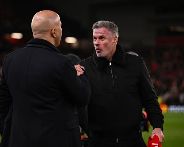 Arne Slot, manger of Liverpool, shakes hands with Jamie Carragher, former Liverpool player and TV pundit prior (Photo by Liverpool FC/Liverpool FC via Getty Images)