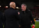 Arne Slot, manger of Liverpool, shakes hands with Jamie Carragher, former Liverpool player and TV pundit prior (Photo by Liverpool FC/Liverpool FC via Getty Images)