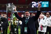 Yasir Al-Rumayyan with the Carabao Cup.