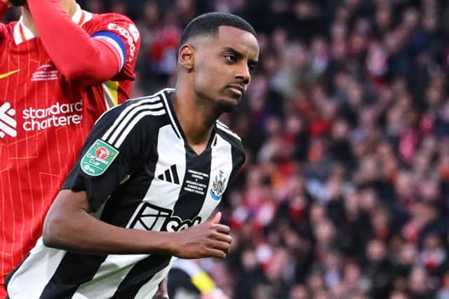 Alexander Isak of Newcastle United celebrates scoring his team's second goal as Virgil van Dijk of Liverpool looks dejected during the Carabao Cup Final between Liverpool and Newcastle United at Wembley Stadium on March 16, 2025 in London, England. (Photo by Stu Forster/Getty Images)