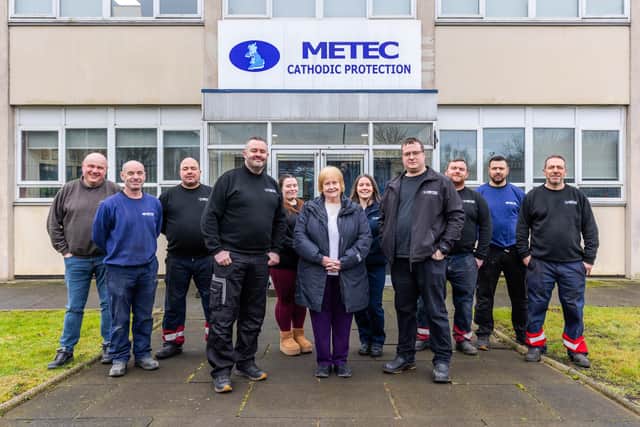 South Shields-based Metec UK has secured two contracts worth more than £4.5million. Cllr Margaret Meling (centre) with Simon Cross (left), Paul Wheeler (right) and members of the Metec UK team outside of the company’s South Shields facility.