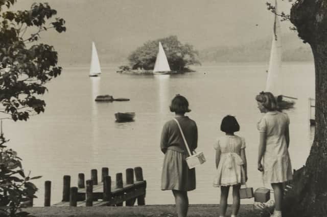 Children complete with their gas masks were loving the view of the yachts in Bowness Bay, Windermere. (Photo by Hulton Archive/Getty Images)