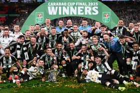 The Newcastle United squad and members of the coaching staff celebrate in a team picture after  the Carabao Cup Final between Liverpool and Newcastle United at Wembley Stadium on March 16, 2025 in London, England. (Photo by Stu Forster/Getty Images)
