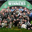 The Newcastle United squad and members of the coaching staff celebrate in a team picture after  the Carabao Cup Final between Liverpool and Newcastle United at Wembley Stadium on March 16, 2025 in London, England. (Photo by Stu Forster/Getty Images)