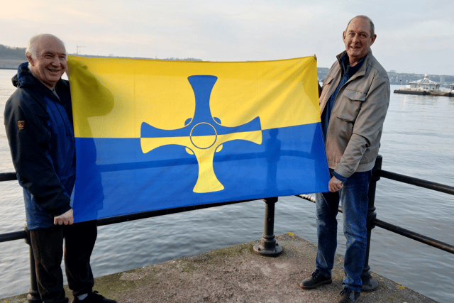 Graeme Keedy and Terry Ford with the County Durham flag.