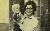 Jean Cameron and her son who were preparing themselves for a trek to their toilet in 1971.