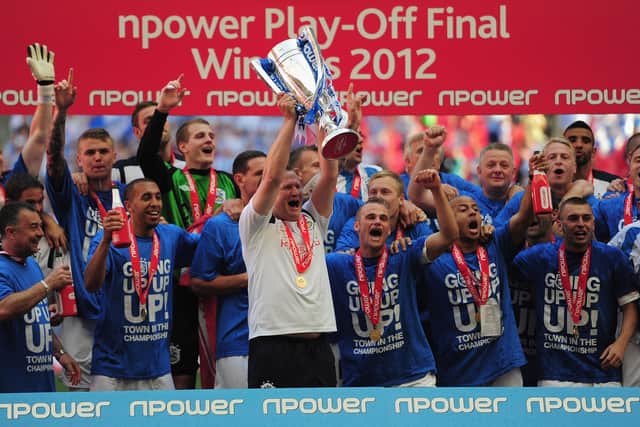 Simon Grayson led Huddersfield Town to a League One play-off final victory in 2012. 