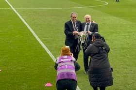 Darren Eales and Bob Moncur with Carabao Cup trophy at St James' Park
