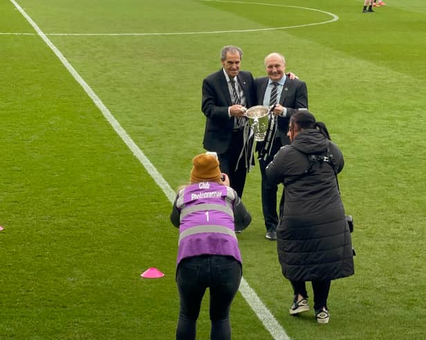 Darren Eales and Bob Moncur with Carabao Cup trophy at St James' Park