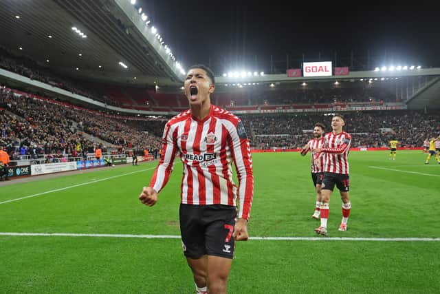 Jobe celebrating his opening goal against Derby County at the Stadium of Light on October 1.