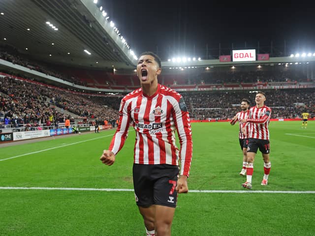Jobe celebrating his opening goal against Derby County at the Stadium of Light on October 1.