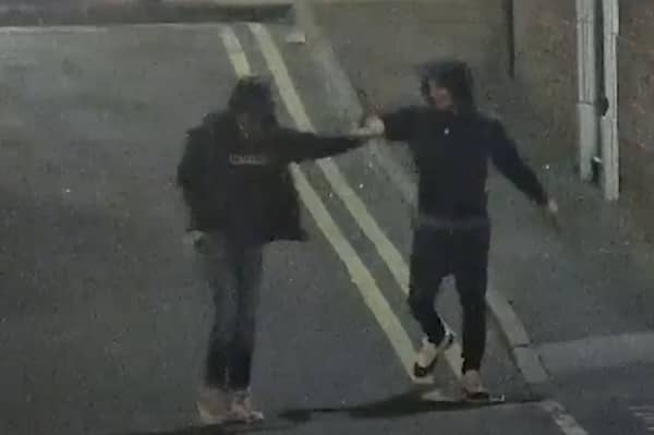 Ramaray Treasure and Leon Sykes fist bump moments after raining blows on a man with West Street with knives in hand.