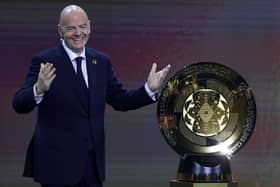 FIFA President Gianni Infantino presents The FIFA Club World Cup Trophy during the 2025 FIFA Club World Cup Draw at Telemundo Studios on December 05, 2024 in Miami, Florida.  (Photo by Brennan Asplen/Getty Images)
