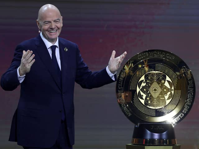 FIFA President Gianni Infantino presents The FIFA Club World Cup Trophy during the 2025 FIFA Club World Cup Draw at Telemundo Studios on December 05, 2024 in Miami, Florida.  (Photo by Brennan Asplen/Getty Images)