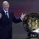 FIFA President Gianni Infantino presents The FIFA Club World Cup Trophy during the 2025 FIFA Club World Cup Draw at Telemundo Studios on December 05, 2024 in Miami, Florida.  (Photo by Brennan Asplen/Getty Images)