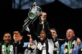 Newcastle United winger Jacob Murphy with the Carabao Cup. 