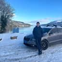 Yukun with his trusty Chinese car.