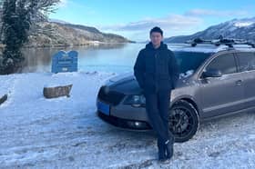 Yukun with his trusty Chinese car.