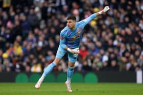 Karl Darlow of Leeds United throws the ball during the Emirates FA Cup Fourth Round match between Leeds United and Millwall at Elland Road on February 08, 2025 in Leeds, England. 
