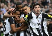 Alexander Isak of Newcastle celebrates with team mates Jacob Murphy (l) Bruno Guimaraes and Sandro Tonali (r) after scoring the first Newcastle goal during the Premier League match between Newcastle United FC and Brentford FC at St James' Park on April 02, 2025 in Newcastle upon Tyne, England. (Photo by Stu Forster/Getty Images)