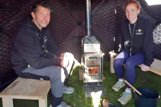 John and Kimberly inside the pop-up sauna.