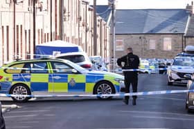 Police at the scene on Elm Street in Stanley, County Durham, where an investigation was launched after a man died following a reported shooting.