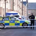Police at the scene on Elm Street in Stanley, County Durham, where an investigation was launched after a man died following a reported shooting.