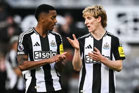 Newcastle United's English midfielder #28 Joe Willock (L) and Newcastle United's English midfielder #10 Anthony Gordon speak at the end of the English Premier League football match between Newcastle United and Bournemouth at St James' Park in Newcastle-upon-Tyne, north east England on January 18, 2025. Bournemouth wins 4 - 1 against Newcastle United. (Photo by Oli SCARFF / AFP) 