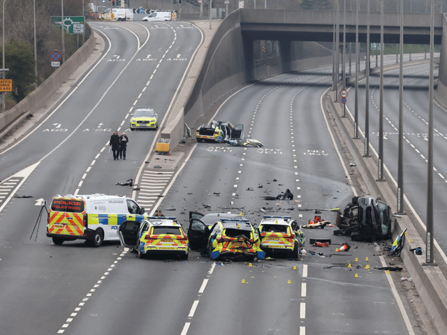 Two people have been arrested after seven police officers required hospital treatment following a collision on the A1.