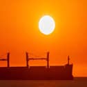 Striking sunrise over ship on the Port of Tyne.