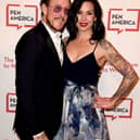 The wife of Weezer bassist Scott Shriner has been booked for attempted murder after an altercation with Los Angeles police on Monday afternoon.