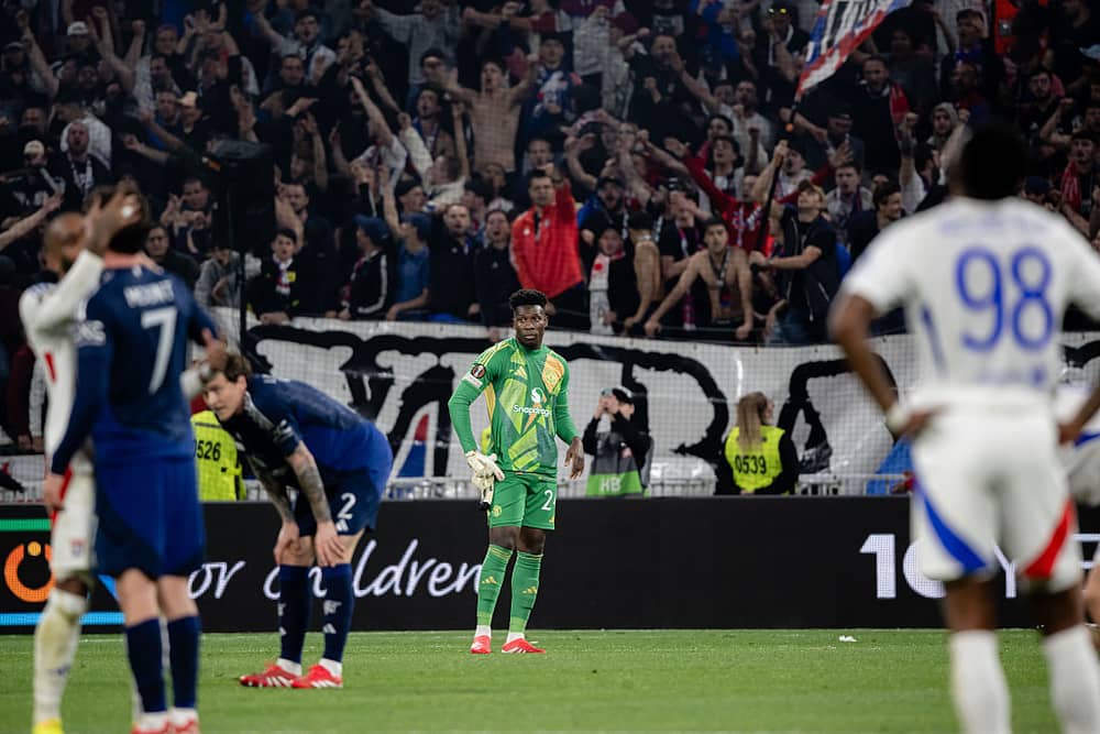 Andre Onana of Manchester United in action during the UEFA Europa League 2024/25 Quarter Final First Leg match between Olympique Lyonnais and Manchester United at OL Stadium on April 10, 2025 in Decines-Charpieu, France. (Photo by Ash Donelon/Manchester United via Getty Images)