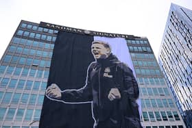A detailed view of a giant banner of Eddie Howe, Manager of Newcastle United, on the side of the Sandman Signature Hotel, during the Newcastle United trophy parade and celebration on March 29, 2025 in Newcastle upon Tyne, England. Newcastle United defeated Liverpool in the Carabao Cup Final to end their seventy-year domestic trophy drought. (Photo by Stu Forster/Getty Images)