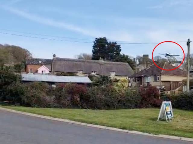 A dramatic video captures the moment a plane came in low and hit a chimney before crashing at an Isle of Wight holiday park.