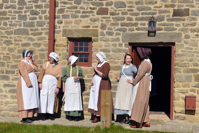 The cottages are in the 1820s landscape