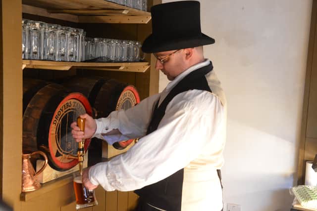 You can enjoy a pint at Drovers Tavern next door