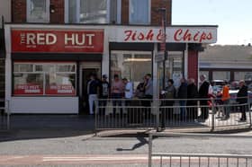The scene at the Red Hut on Ocean Road as people queue for food in 2014.