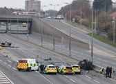 A man is set to appear in charge following a crash on the A1 that left seven police officers needing hospital treatment.