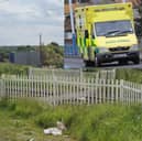 A person has been taken to hospital after being injured at Blue House Lane level crossing in Whitburn.