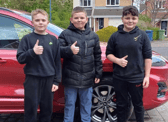 Kayne Gibson (left), Tyler Hemmer (middle), and Charlie Smith have been received heaps of praise on social media after they have been going around Hebburn washing cars.