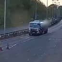 Driver travels towards oncoming traffic on dual carriageway.