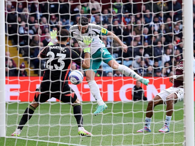 Fabian Schar of Newcastle United scores his team's first goal as Emiliano Martinez of Aston Villa fails to make a save during the Premier League match between Aston Villa FC and Newcastle United FC at Villa Park on April 19, 2025 in Birmingham, England. (Photo by Michael Steele/Getty Images)