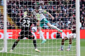 Fabian Schar of Newcastle United scores his team's first goal as Emiliano Martinez of Aston Villa fails to make a save during the Premier League match between Aston Villa FC and Newcastle United FC at Villa Park on April 19, 2025 in Birmingham, England. (Photo by Michael Steele/Getty Images)