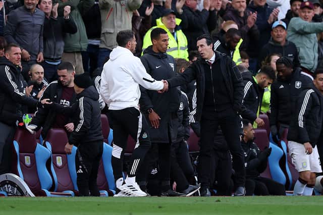 Jason Tindall, Interim Manager of Newcastle United, shakes hands with Unai Emery, Manager of Aston Villa, after the Premier League match between Aston Villa FC and Newcastle United FC at Villa Park on April 19, 2025 in Birmingham, England. (Photo by Michael Steele/Getty Images)