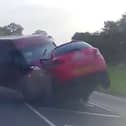Minibus smashes head-on into car - seriously injuring three.