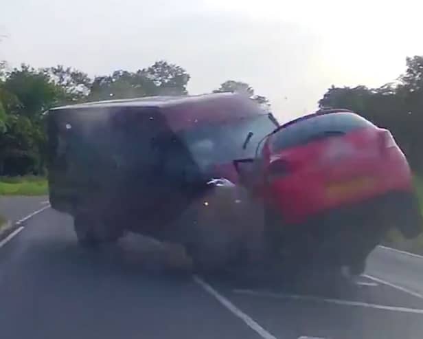 Minibus smashes head-on into car - seriously injuring three.