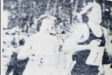A blurred archive photo of John Walker just in front of Shields runner Mike Kearns.